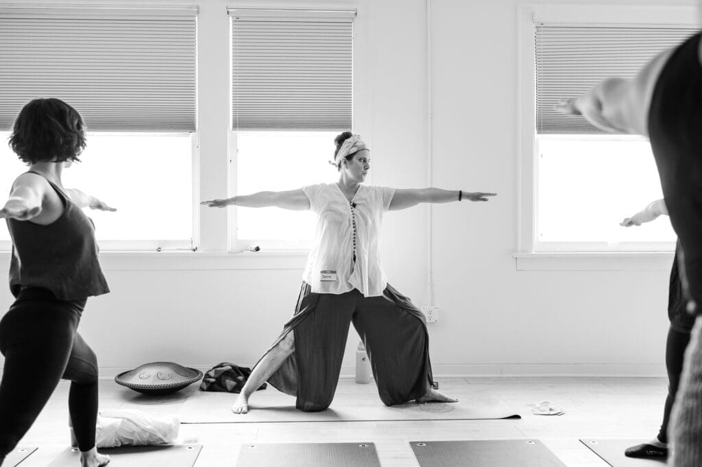 Jena Ashwill Cleveland holistic doula teaching a yoga class
