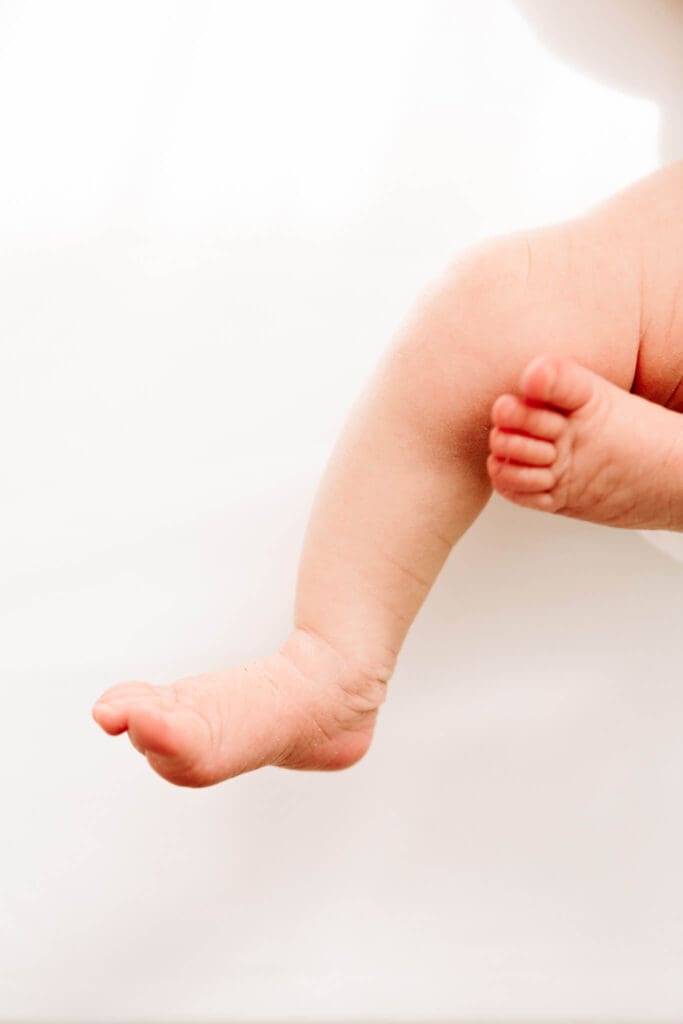 A sweet detail of a newborn’s foot—reminding us how fast these little features grow after the newborn stage.