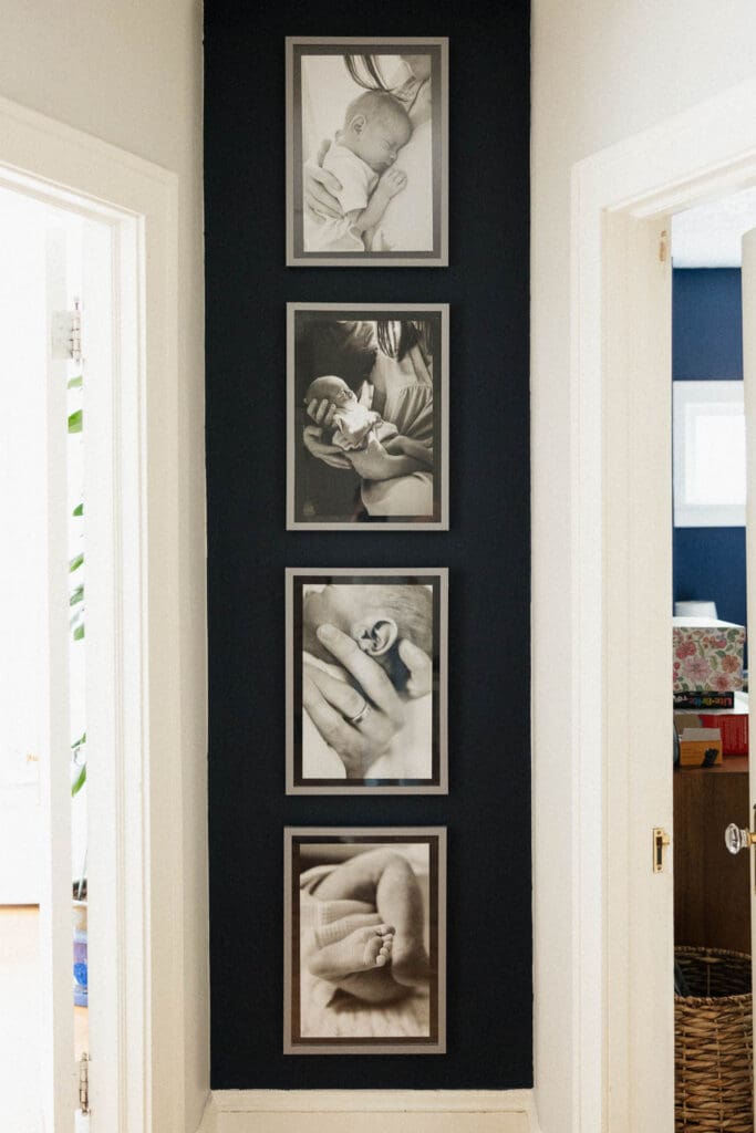 A four frame gallery wall in a Cleveland Heights hallways